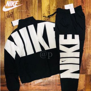 ナイキ(NIKE)の新品 NIKE ナイキ ウーブン ジャケット&パンツ 黒 上下セット XL(ナイロンジャケット)