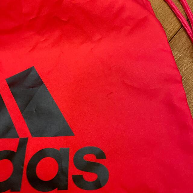 adidas(アディダス)のadidas  アディダス　ナップサック　赤　 メンズのバッグ(バッグパック/リュック)の商品写真