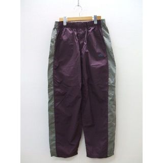 ザノースフェイス(THE NORTH FACE)のTHE NORTH FACE Mountain Wind Pants NP5850N WM ナイロン パンツ パープル レディース  ザノースフェイス【中古】2-0116G∞(カジュアルパンツ)