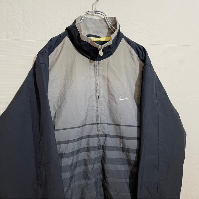 NIKE NIKE ナイキ 00s ナイロンジャケット 刺繍ロゴ サイズL相当の通販 by 春物入荷☆古着屋APICO◁☆即購入OK|ナイキ ならラクマ NIKE y2kアーカイブストカジゴープコアテック刺繍ロゴナイロンジャケット