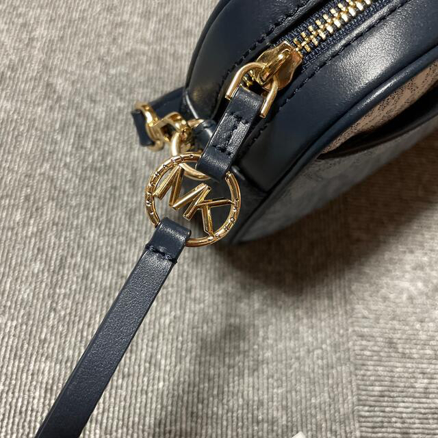 値下げ】 ✨新品✨総柄 MICHAEL KORS レザーxPVC スマホ ショルダー