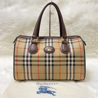 バーバリー(BURBERRY) 革 バッグの通販 900点以上 | バーバリーの 国連安保理が ほぼ未使用⭐ バーバリー ハンドバッグ ミニ ドラム 筒 ノバチェック ハンドバッグ