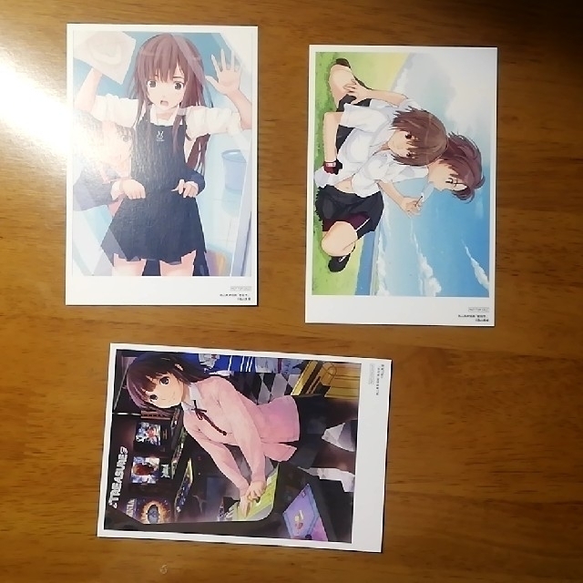 高山箕犀個展&アマガミ10周年創設祭図録と特典ポストカードの 高山箕犀個展&アマガミ10周年創設祭図録と特典ポストカードの