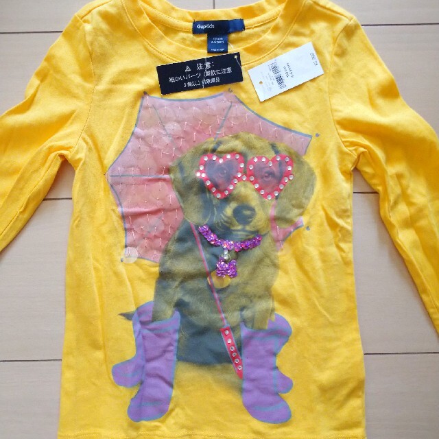 GAP Kids(ギャップキッズ)のGapKids 110cm 長袖 黄色 ロンT 犬 傘 長靴 キラキラ イエロー キッズ/ベビー/マタニティのキッズ服女の子用(90cm~)(Tシャツ/カットソー)の商品写真