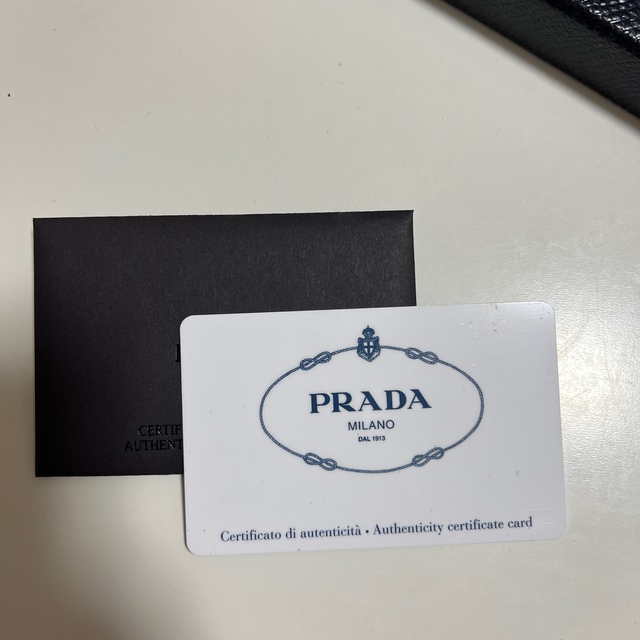 PRADA(プラダ)の☆SIN様専用☆プラダ　財布　二つ折り　ブルー　小さい財布　箱付き レディースのファッション小物(財布)の商品写真