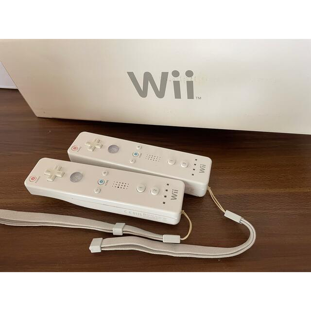 Wii(ウィー)のwii本体 ハンドル2個 マリオパーティ8・マリオカートなどソフト4本 エンタメ/ホビーのゲームソフト/ゲーム機本体(家庭用ゲーム機本体)の商品写真