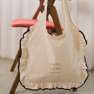 スナイデル(SNIDEL)のSNIDEL HOME フリルエコトートバッグ　ホワイト　新品未使用　タグ付き(トートバッグ)