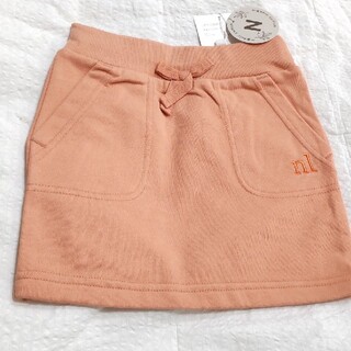 ベベノイユ(BEBE Noeil)の新品　BeBeNoeil リボン付オーガニック生地オレンジ色スカート100cm(スカート)