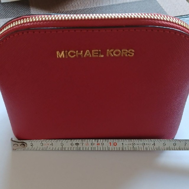 Michael Kors(マイケルコース)の【新品】MICHAEL KORS　ポーチ　赤 レディースのファッション小物(ポーチ)の商品写真