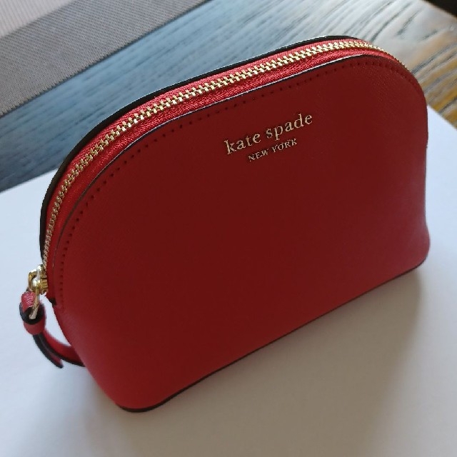 kate spade new york(ケイトスペードニューヨーク)の【新品】kate spade　ポーチ　赤 レディースのファッション小物(ポーチ)の商品写真