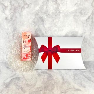 クラランス(CLARINS)のプレゼントに！ラッピング済 限定 クラランス リップコンフォートオイル サクラ(リップケア/リップクリーム)