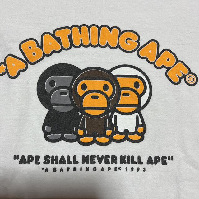 A BATHING APE(アベイシングエイプ)のAPE BAPE  KAWS BABY MILO tee tシャツ M 白 メンズのトップス(Tシャツ/カットソー(半袖/袖なし))の商品写真