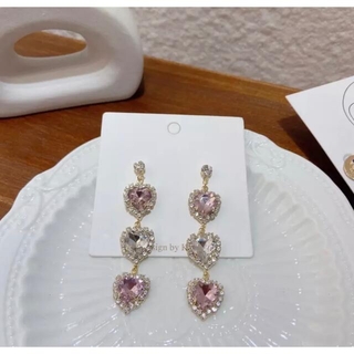 リルリリー(lilLilly)のtriple heart earring(pink)(ピアス)