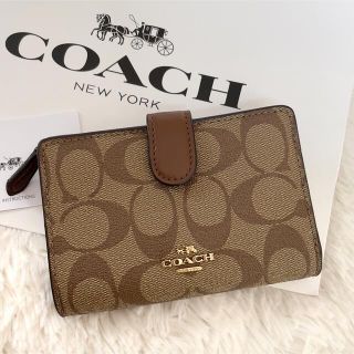 コーチ(COACH)の【美品】COACH コーチ 二つ折り財布 シグネチャー ラウンドファスナー 馬車(財布)