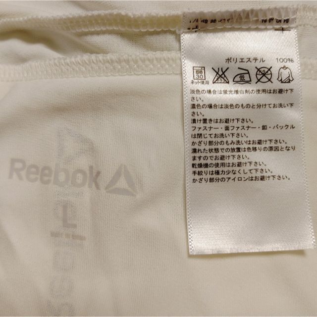 Reebok(リーボック)のリーボック★L 白★吸汗速乾★半袖Tシャツ カットソー エコピュア ラウンドヘム レディースのトップス(Tシャツ(半袖/袖なし))の商品写真