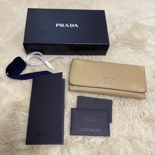 プラダ(PRADA)の中古品　プラダ　長財布　ベージュ✖️ゴールド　サフィアーノ(財布)