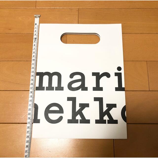 marimekko(マリメッコ)の【新品・未使用】marimekko・ショッパー（紙袋） レディースのバッグ(ショップ袋)の商品写真