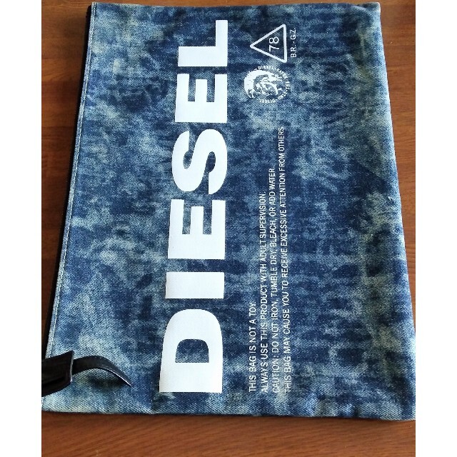 DIESEL(ディーゼル)のディーゼル　クラッチバック　デニム生地 メンズのバッグ(セカンドバッグ/クラッチバッグ)の商品写真