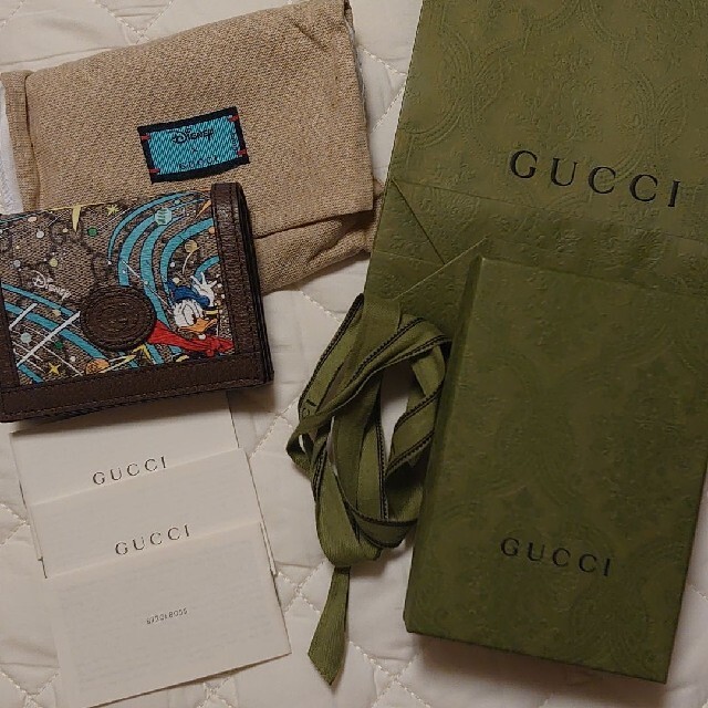 Gucci - グッチ ディズニーコラボ ドナルド 二つ折り財布の通販 by み