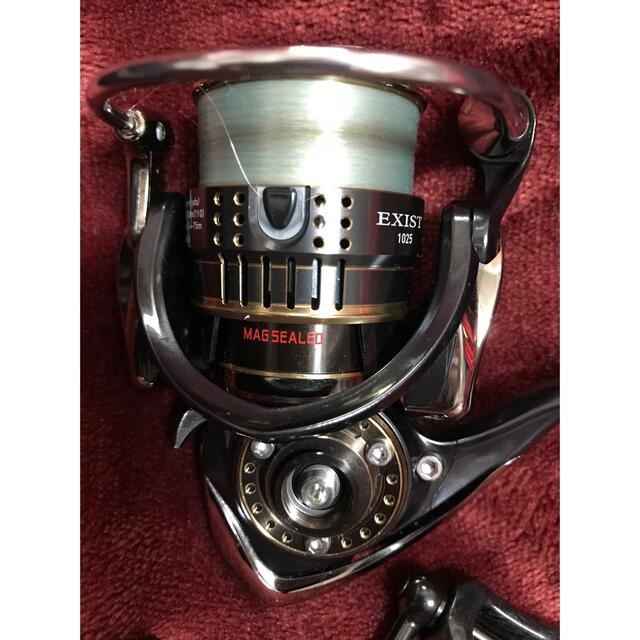 DAIWA(ダイワ)のダイワ15 イグジスト1025 一回のみ使用美品 スポーツ/アウトドアのフィッシング(リール)の商品写真