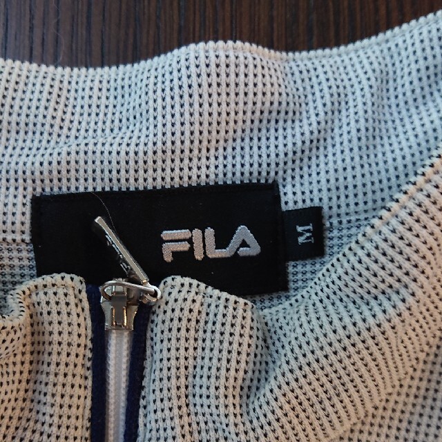 FILA(フィラ)の更に値下げ❗FILA ゴルフウェア レディースM 白×ネイビー 普段着にも スポーツ/アウトドアのゴルフ(ウエア)の商品写真