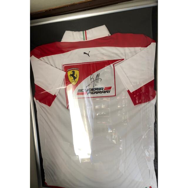 Ferrari(フェラーリ)のフェラーリ　セバスチャンベッテル  直筆サイン入りユニフォーム スポーツ/アウトドアの自転車(ウエア)の商品写真