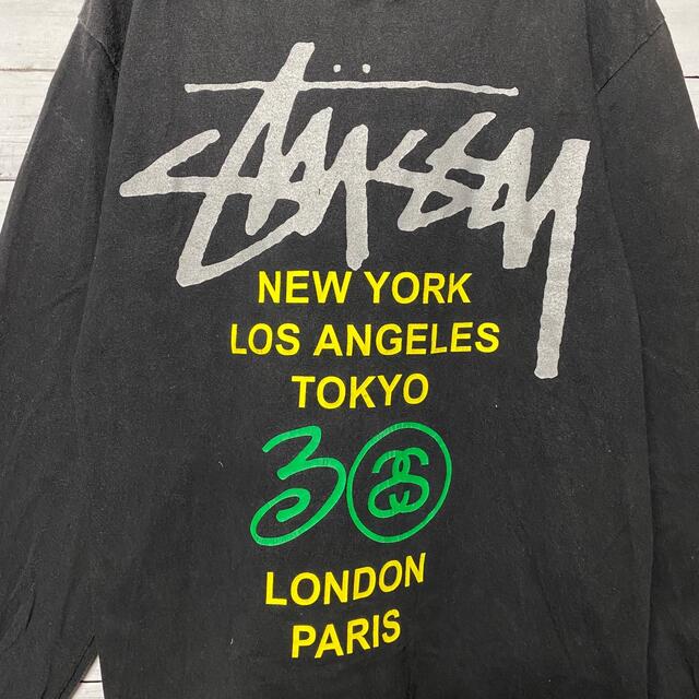 STUSSY(ステューシー)の【USA製】ステューシー☆ワールドツアー両面プリントブラックTシャツロンT メンズのトップス(Tシャツ/カットソー(七分/長袖))の商品写真