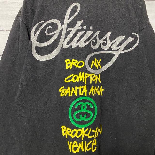 STUSSY(ステューシー)の【USA製】ステューシー☆ワールドツアー両面プリントブラックTシャツロンT メンズのトップス(Tシャツ/カットソー(七分/長袖))の商品写真