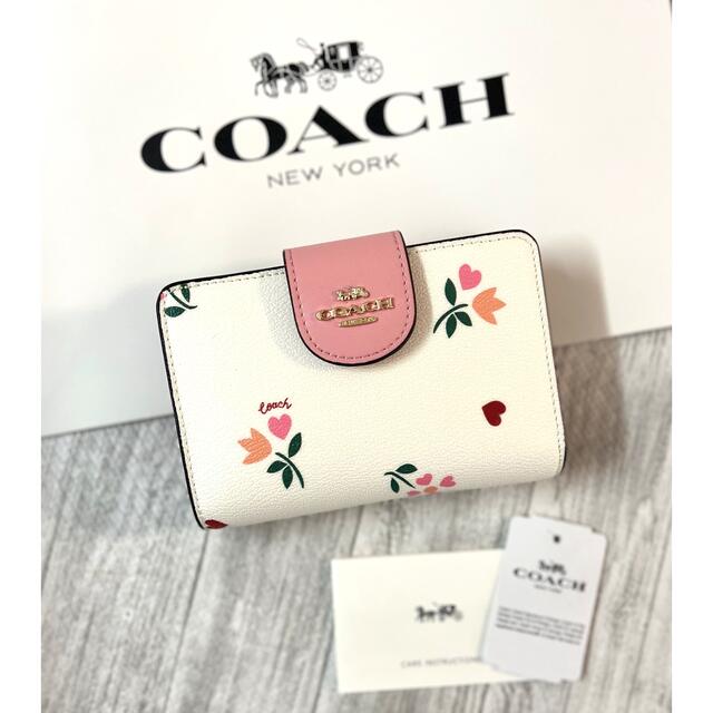 COACH コーチ　折り財布　ホワイト　白色　ドリーミーベジ柄　ピンク