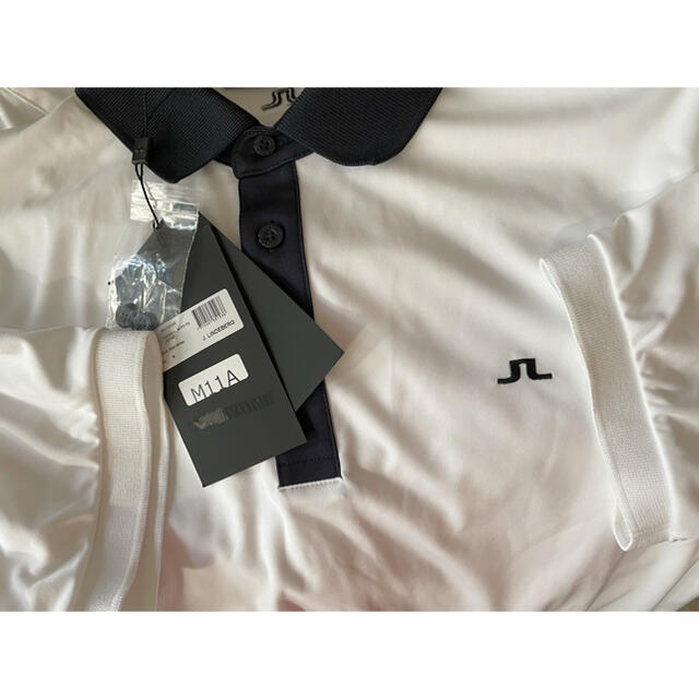 J.LINDEBERG(ジェイリンドバーグ)のリンドバーグ　メンズゴルフウェア　夏物半袖ポロシャツ　新品未使用　白黒　M スポーツ/アウトドアのゴルフ(ウエア)の商品写真