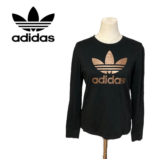 adidas(アディダス)のアディダス　adidas originals ロンT トレフォイル 黒×金　M レディースのトップス(Tシャツ(長袖/七分))の商品写真