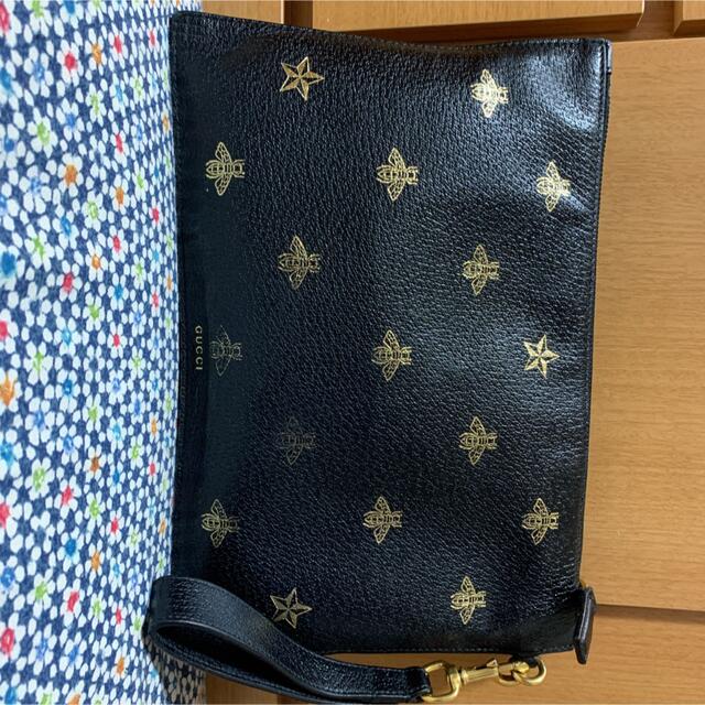 Gucci(グッチ)のGUCCIグッチ 蜂スターのモチーフ　クラッチバッグ  ブラック ゴールド レディースのバッグ(クラッチバッグ)の商品写真