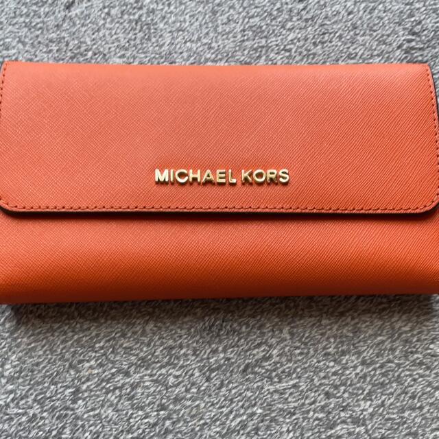 Michael Kors(マイケルコース)のMICHEAL KORS オレンジ長財布 GW中！お値下げしました レディースのファッション小物(財布)の商品写真