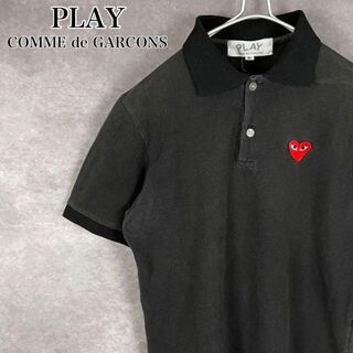 コムデギャルソン(COMME des GARCONS)のCOMME de GARCONSプレイコムデギャルソン　ポロシャツ　ワッペンロゴ(ポロシャツ)