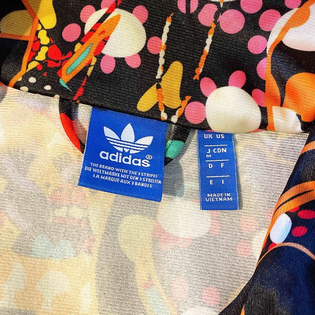 adidas(アディダス)のアディダス ファーム ジャージ ジャケット ブルゾン パレード 花火 花柄 M レディースのジャケット/アウター(ブルゾン)の商品写真