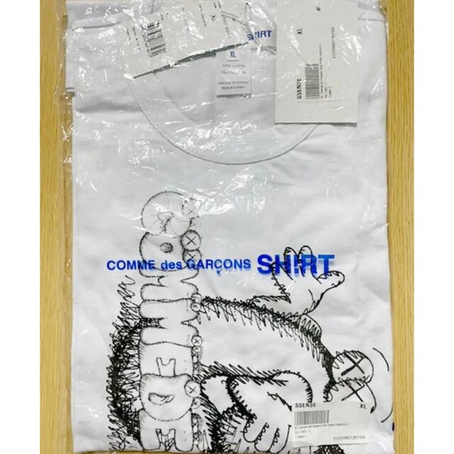 COMME des GARCONS(コムデギャルソン)のコムデギャルソンシャツ x カウズ Tシャツ プリント3 "ホワイト"  XL メンズのトップス(Tシャツ/カットソー(半袖/袖なし))の商品写真