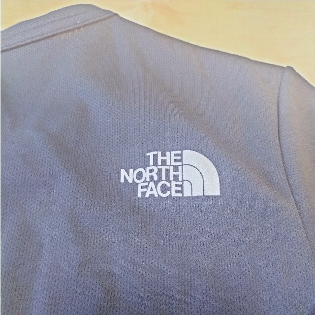 THE NORTH FACE(ザノースフェイス)の【美品】ノースフェイス 長袖シャツ　レディース　M　黒　ランニング　トレイル スポーツ/アウトドアのランニング(ウェア)の商品写真