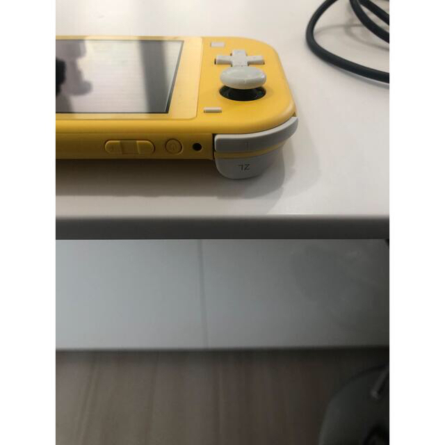 Nintendo Switch(ニンテンドースイッチ)のNintendo Switch Lite イエロー（ソフト、本体カバー付き） エンタメ/ホビーのゲームソフト/ゲーム機本体(家庭用ゲーム機本体)の商品写真