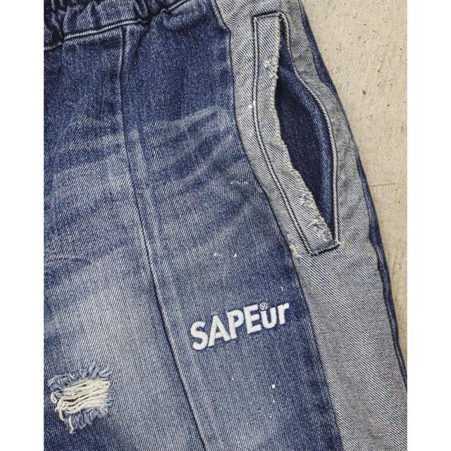 Supreme(シュプリーム)のSAPEUR デニムトラックパンツ　ダメージ　ヴィンテージ メンズのパンツ(デニム/ジーンズ)の商品写真