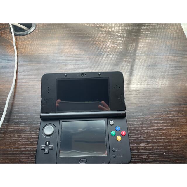 NEW 3DS 本体 ブラック エンタメ/ホビーのゲームソフト/ゲーム機本体(携帯用ゲーム機本体)の商品写真