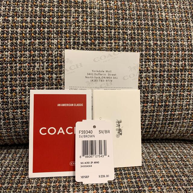 COACH(コーチ)の本体のみ　長財布　ブラウン　ミッキー　ワッペン メンズのファッション小物(長財布)の商品写真