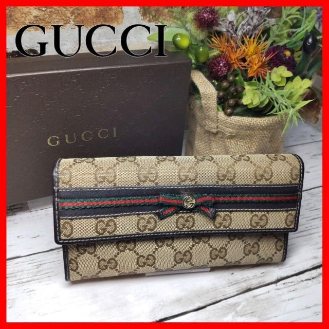 【人気急上昇】 Gucci - 【美品✨】GUCCI シェリーライン シマ キャンバス　長財布　箱付き 財布
