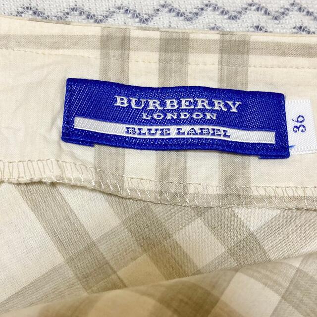 BURBERRY BLUE LABEL(バーバリーブルーレーベル)のバーバリーブルーレーベル　36  S  ノバチェック　ラップスカート   レディースのスカート(ひざ丈スカート)の商品写真