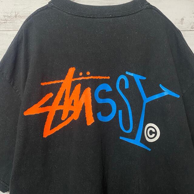 STUSSY(ステューシー)の【希少デザイン】00‘s ステューシー　カラフルプリント　両面ロゴ　Tシャツ メンズのトップス(Tシャツ/カットソー(半袖/袖なし))の商品写真