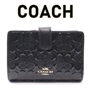 コーチ(COACH)のCOACH デボスド シグネチャー パテント ミディアム コーナーF25937(財布)