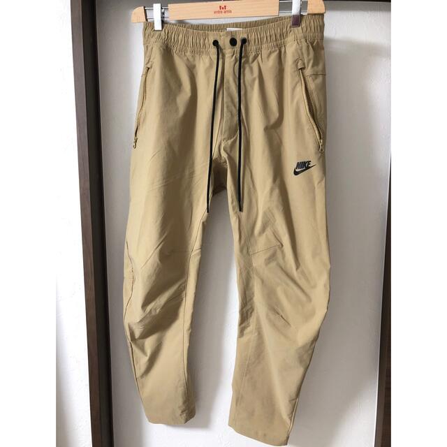 NIKE - NIKE ウーブンパンツ ベージュ Lの通販 by y____10's shop