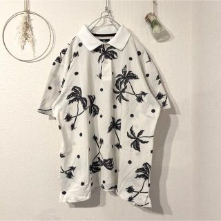 マンシングウェア(Munsingwear)のmunsingwear ドット×ヤシの木柄ポロシャツ(ポロシャツ)