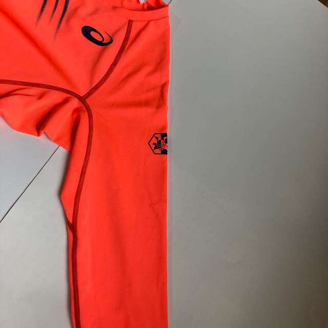 asics(アシックス)のasics オレンジ　ロングTシャツ　ロンT  スポーツ/アウトドアのスポーツ/アウトドア その他(陸上競技)の商品写真