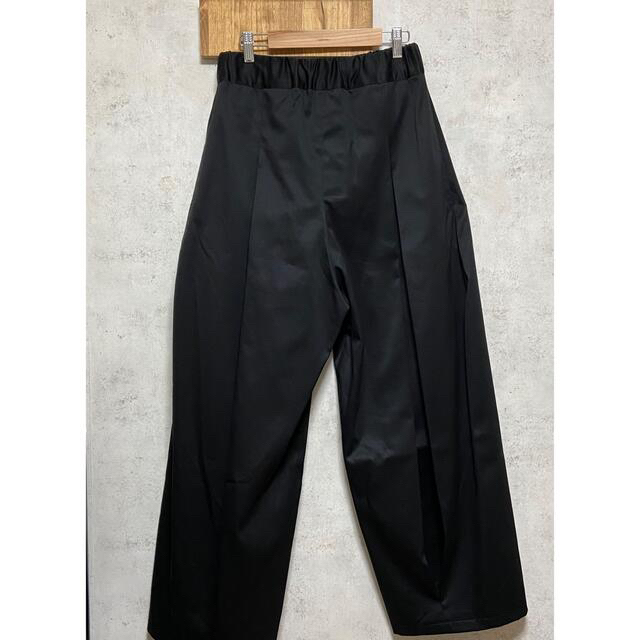 COMOLI(コモリ)のsage nation   box pleat trouser black sm メンズのパンツ(チノパン)の商品写真