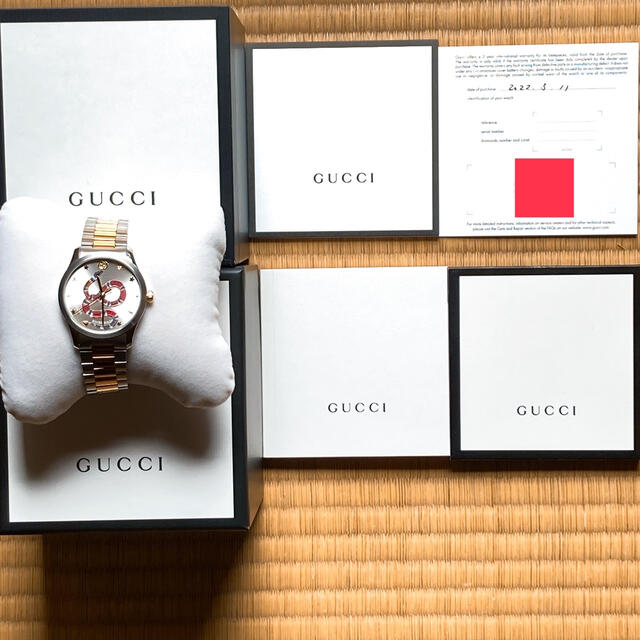 Gucci(グッチ)のグッチ　腕時計　キングスネークGタイムレス　イエローゴールドカラーコンビベルト メンズの時計(腕時計(アナログ))の商品写真